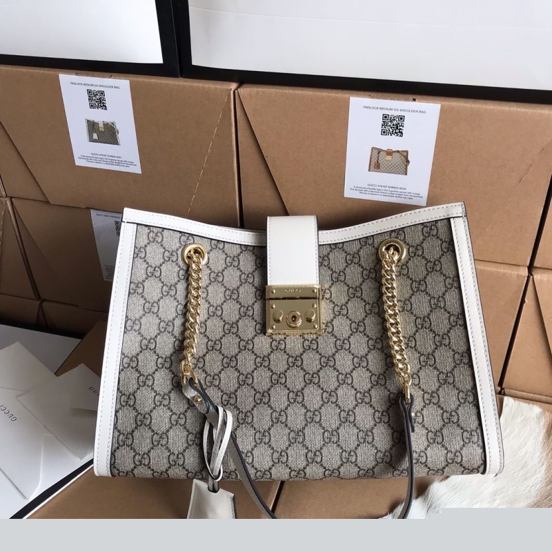 G*u*i shopping bags